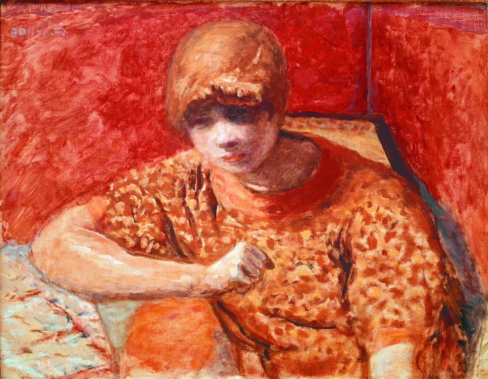 Pomarańczowa bluzka Młoda kobieta marzycielski siedzi ma stół na czerwonym tle. Obraz Pierre'a Bonnarda (1867-1947) 1913 wym. 52x67 cm Paryż, kolekcja prywatna autorstwa Pierre Bonnard