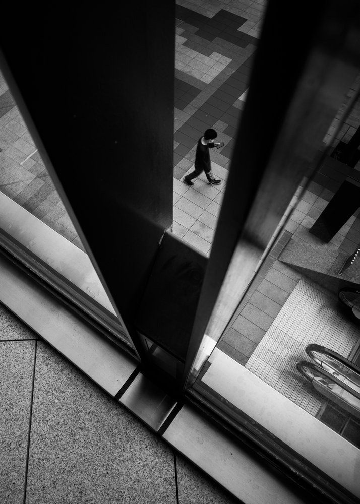 „City Walker” w ramce autorstwa Satoshi Hata