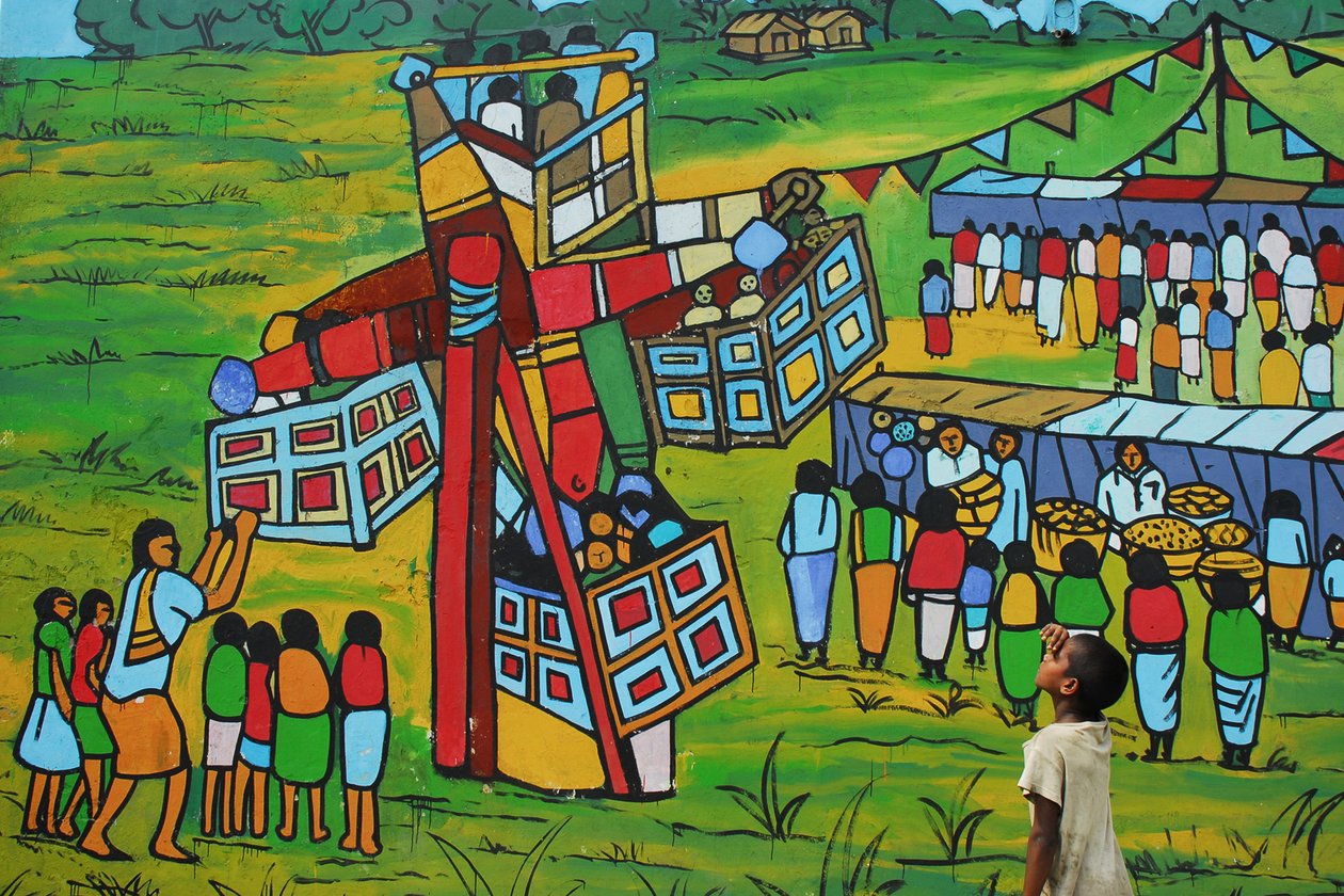 Dziecko widzi malowidło ścienne na ścianie Sonargaon Folk Art Institute w Sonargaon, Dhaka, Bangladesz. 23 marca 2007 r. autorstwa Unknown