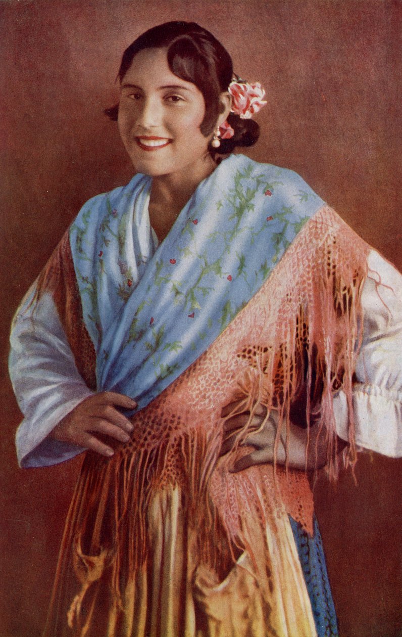 Hiszpania. Hiszpańska Señorita o jasnych oczach i czarującym uśmiechu w typowej sukience. 1920 autorstwa Unknown