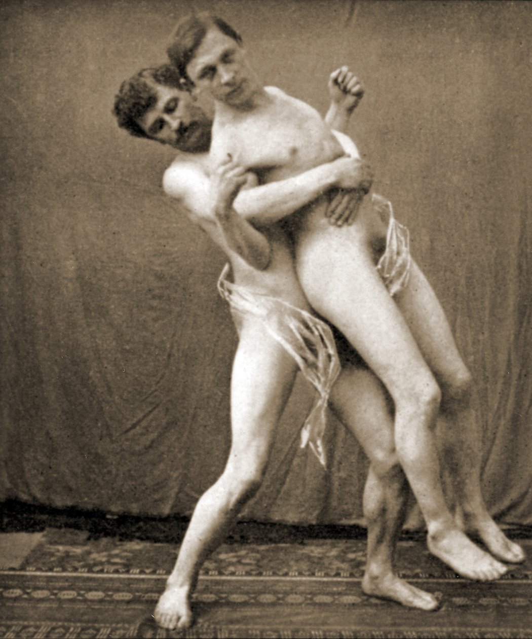 Zapaśnicy demonstrują trzymanie w talii, ok. 1910 (zdjęcie w sepii) autorstwa Unknown