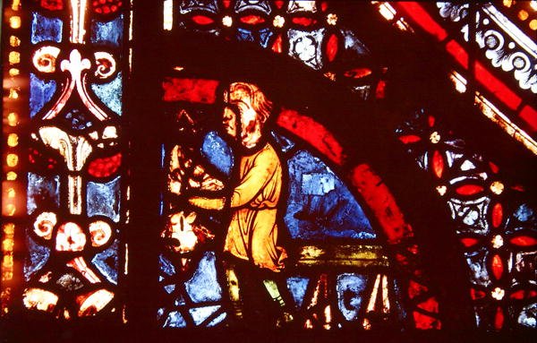 Rzeźnik, detal z lewego dolnego rogu okna Cudów Matki Boskiej w nawie południowej nawy, 1205-15 autorstwa French School