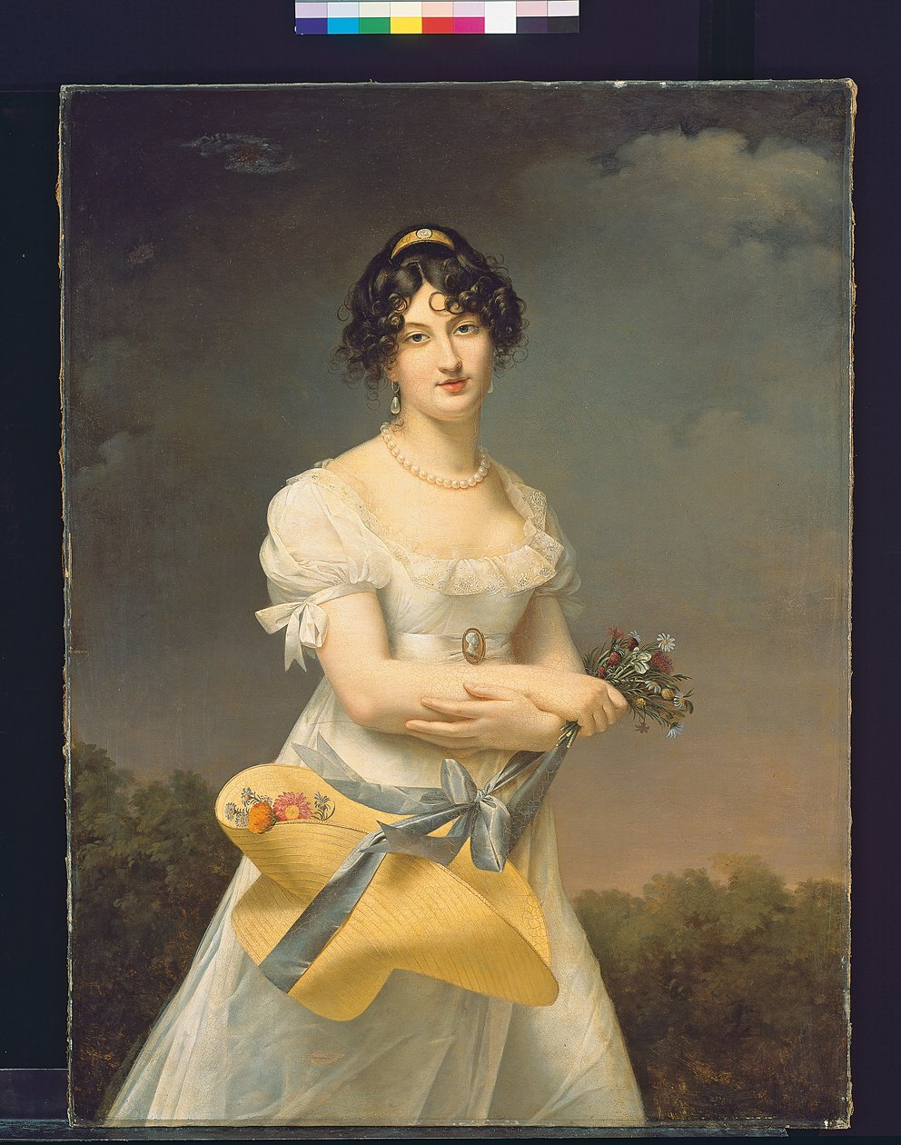Portret Amélie-Justine Laidin de la Bouterie, z domu Pontois, trzymająca kapelusz wypełniony kwiatami autorstwa Adele Romany