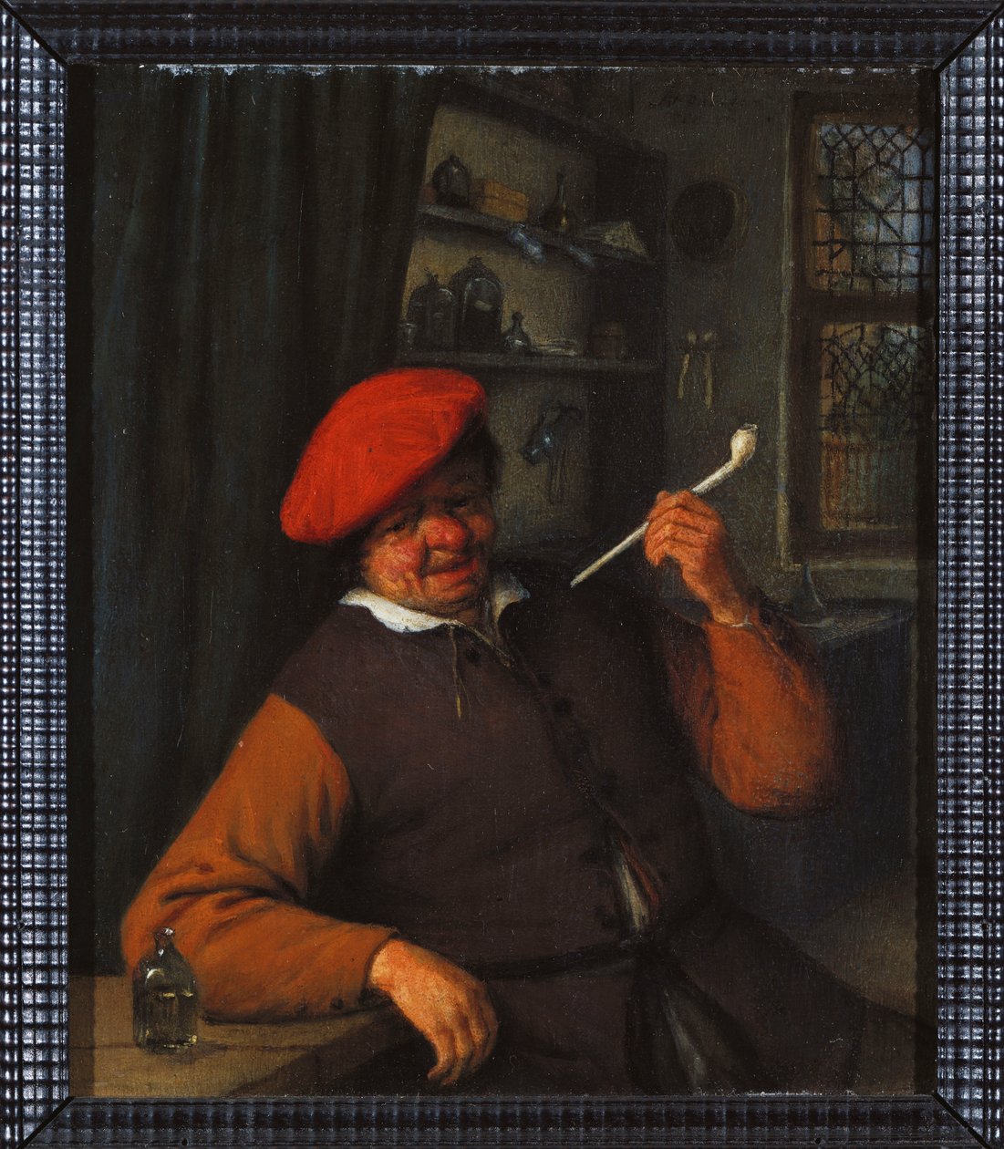 Chłop w czerwonym berecie palący fajkę we wnętrzu autorstwa Adriaen Jansz. van Ostade