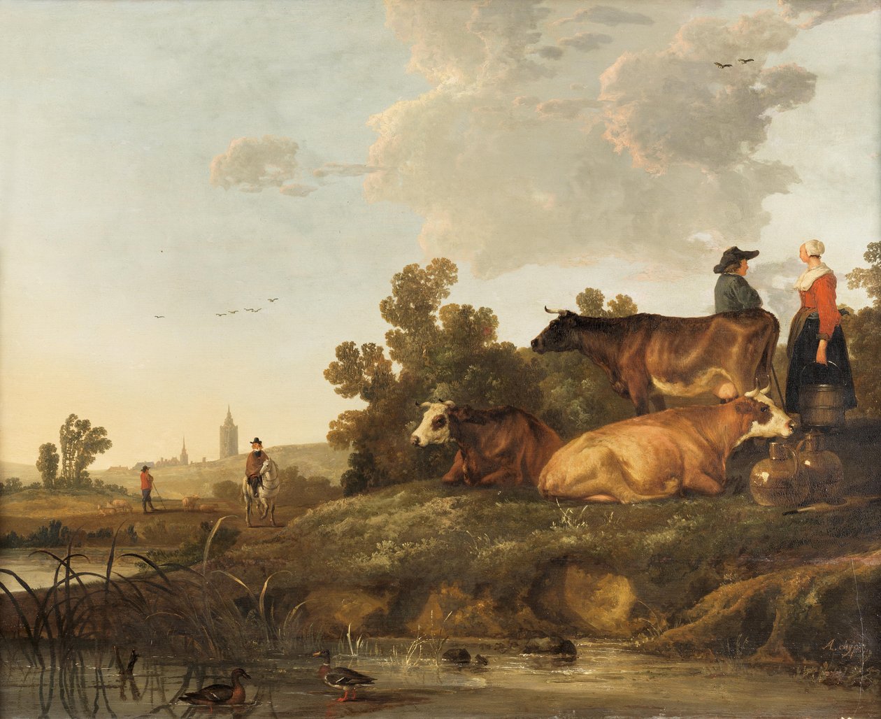 Dozorca i dojarka stojący obok bydła, widok na miasto w oddali autorstwa Aelbert Cuyp