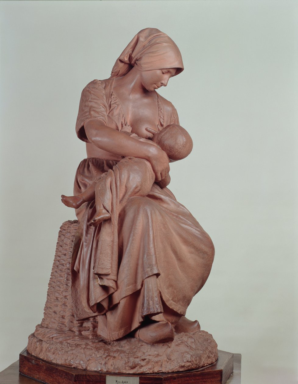Chłopka karmiąca niemowlę, 1873 (terakota) (szczegóły w 183878) autorstwa Aime Jules Dalou