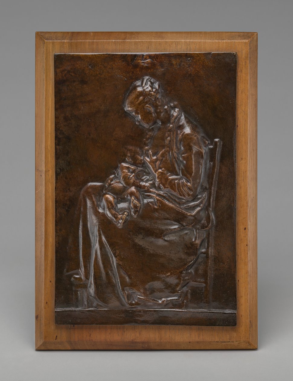 Macierzyństwo, czyli młoda kobieta karmiąca dziecko, model 1882. autorstwa Alexandre Louis Marie Charpentier