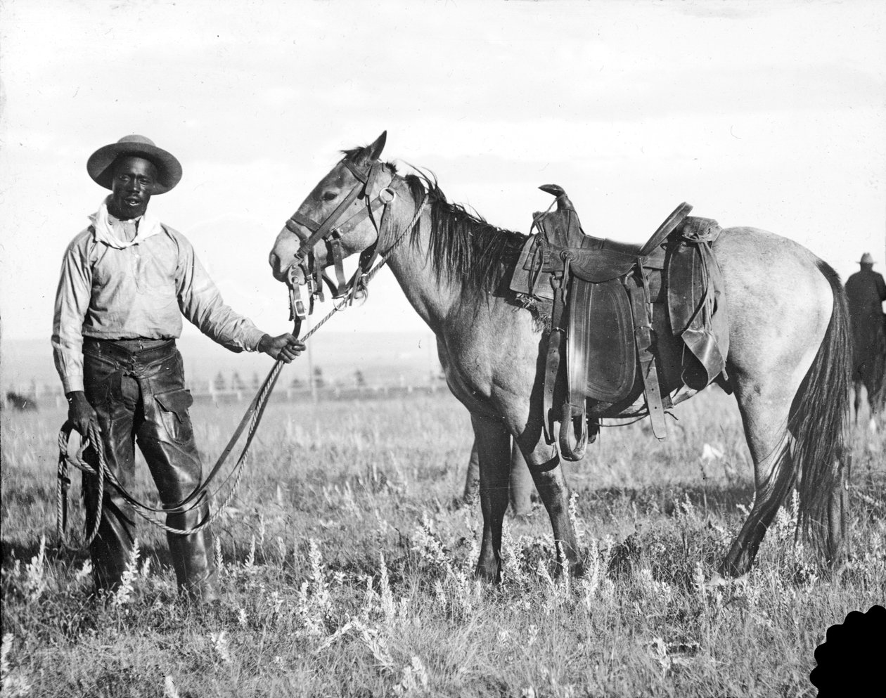 Czarny kowboj i koń, ok. 1890-1920 autorstwa American Photographer