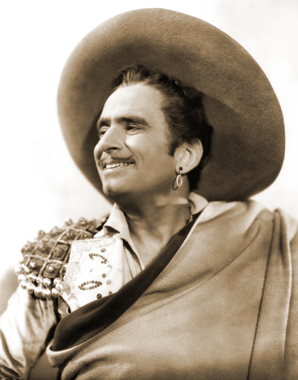 Portret Douglasa Fairbanksa seniora filmującego Prywatne życie Don Juana 1934 autorstwa American Photographer