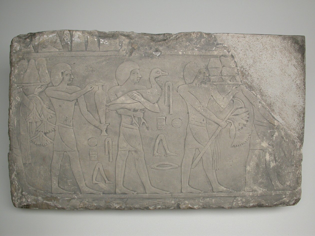 Fragment ściany z grobowca przedstawiający niosących ofiarę autorstwa Ancient Egyptian