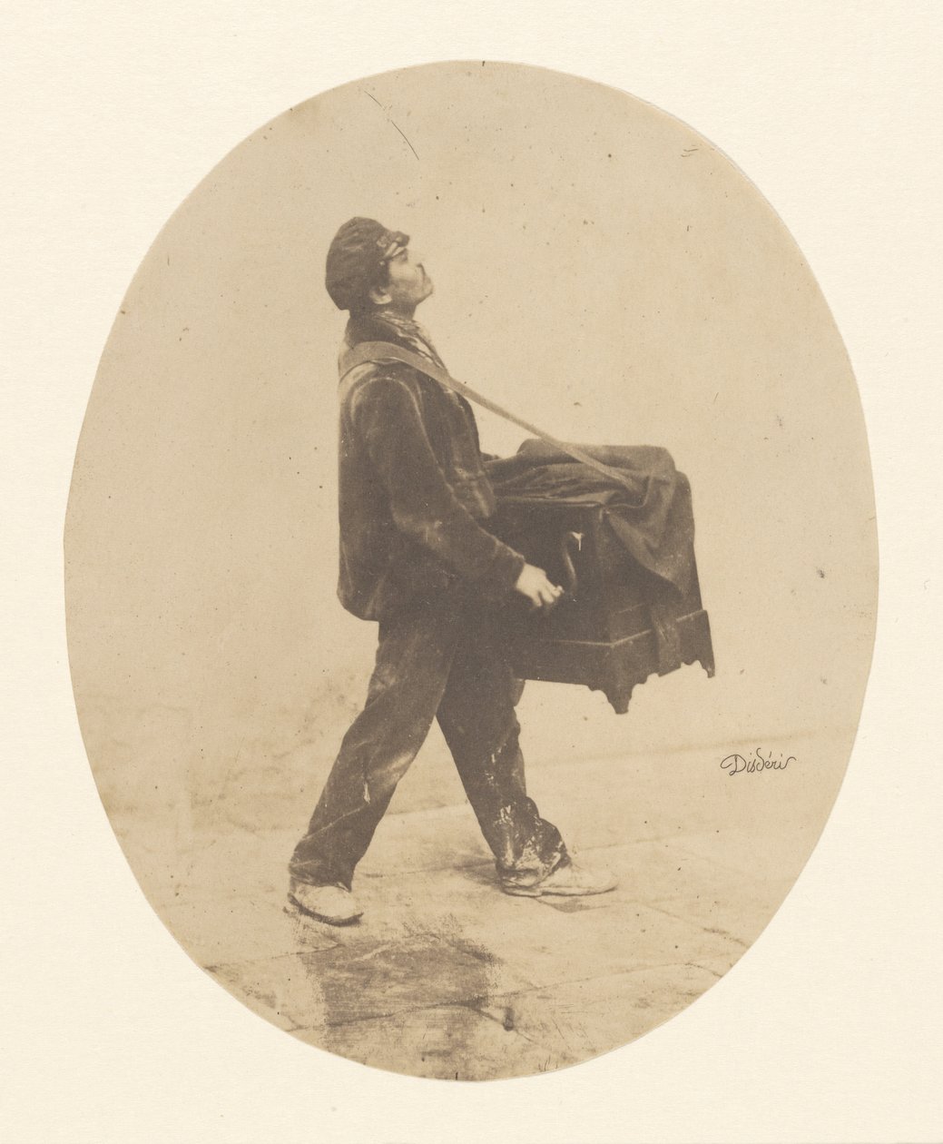 The Organ Grinder autorstwa Andre Adolphe Eugene Disderi