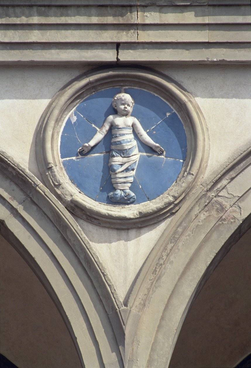 Okrągły z elewacji (glazurowana terakota) autorstwa Andrea Della Robbia
