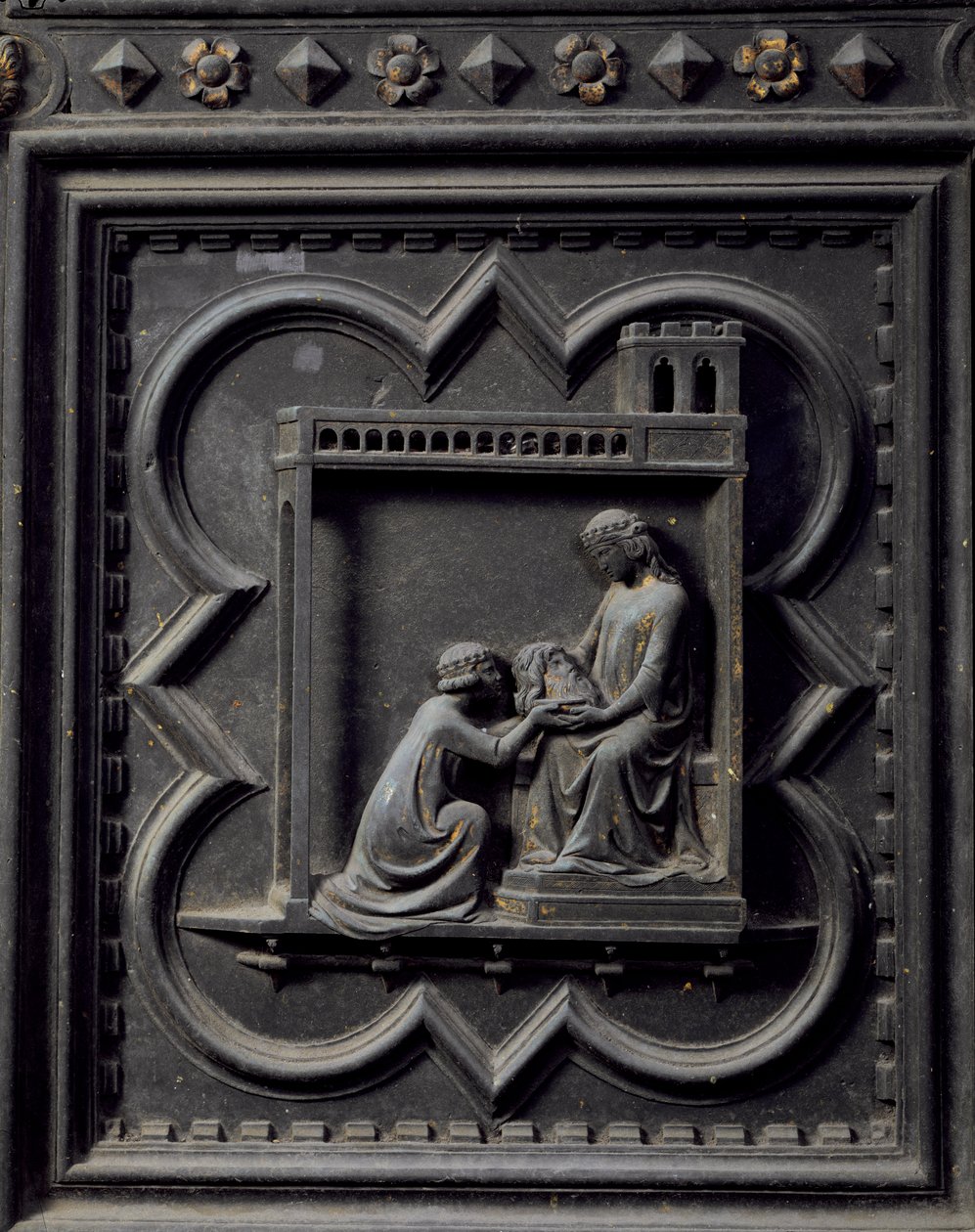 Salome zabiera głowę św. Jana Chrzciciela do swojej Matki Herodiady, żony Heroda, osiemnasty panel południowych drzwi baptysterium San Giovanni, 1336 (brąz) autorstwa Andrea Pisano