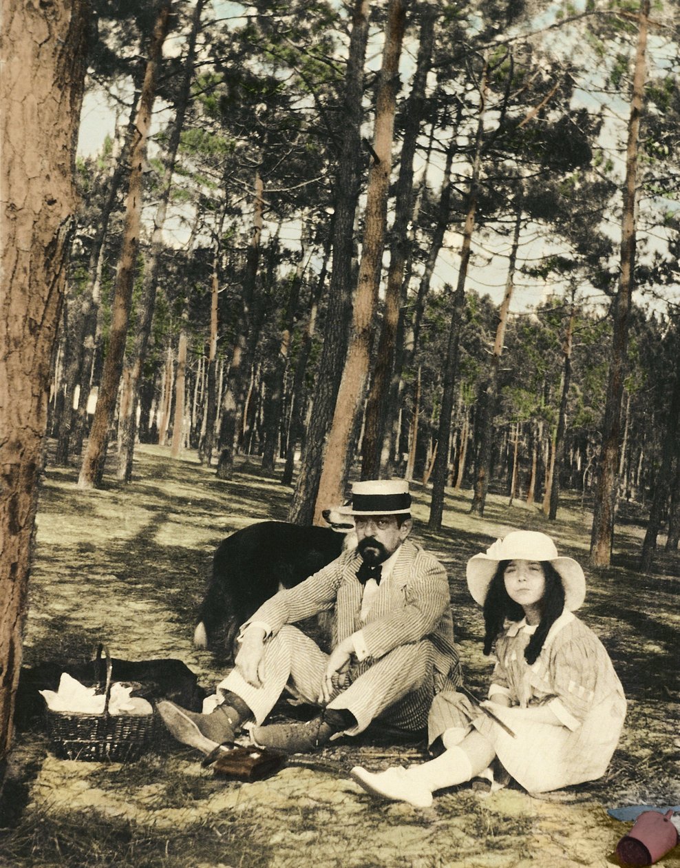 Francuski kompozytor Claude Debussy (1862-1918) i jego córka Chouchou siedzą na pikniku w sosnie niedaleko Arcachon autorstwa Anonymous Anonymous
