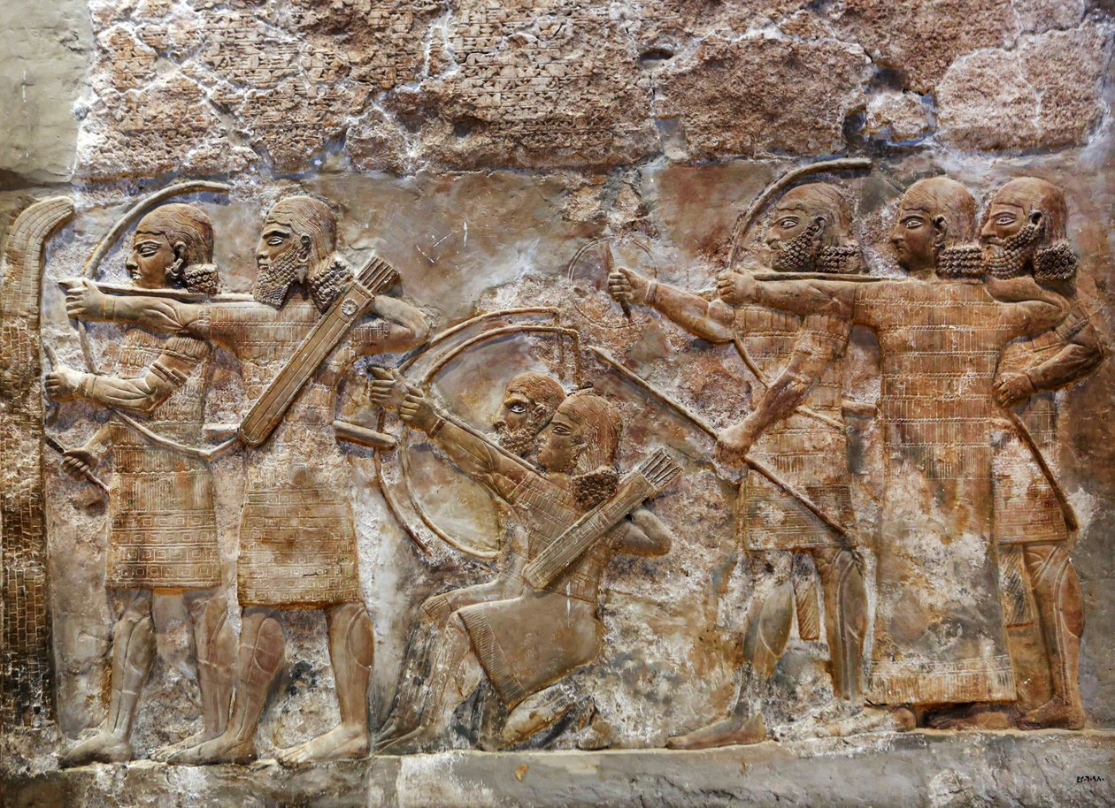 Łucznicy armii asyryjskiej zdobywający ufortyfikowane miasto, relief z Nimrud, ok. 865 pne autorstwa Assyrian