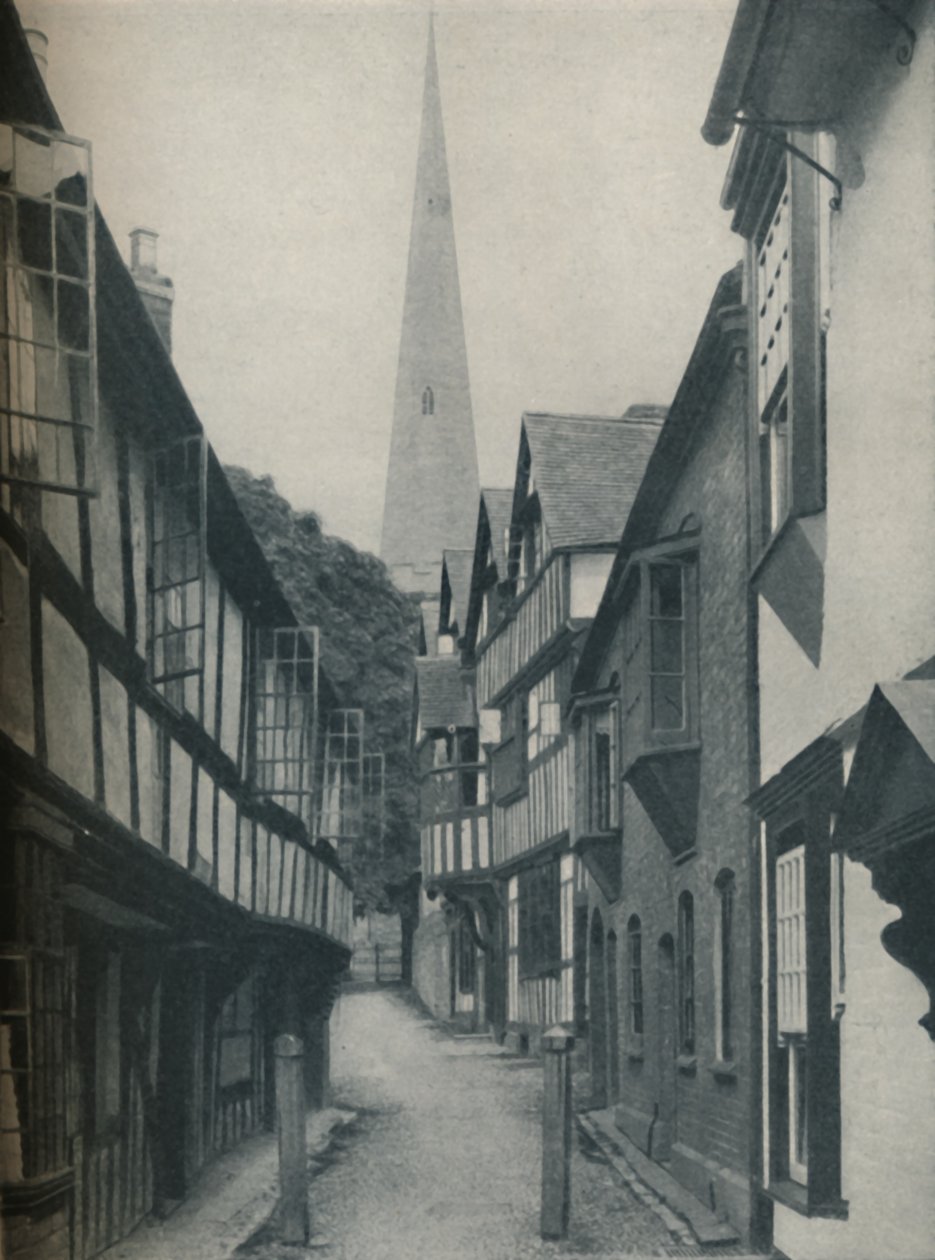 Piękne domy zgromadzone wokół wieży, która wskazuje na niebo, ok. 1935 r autorstwa BC Clayton