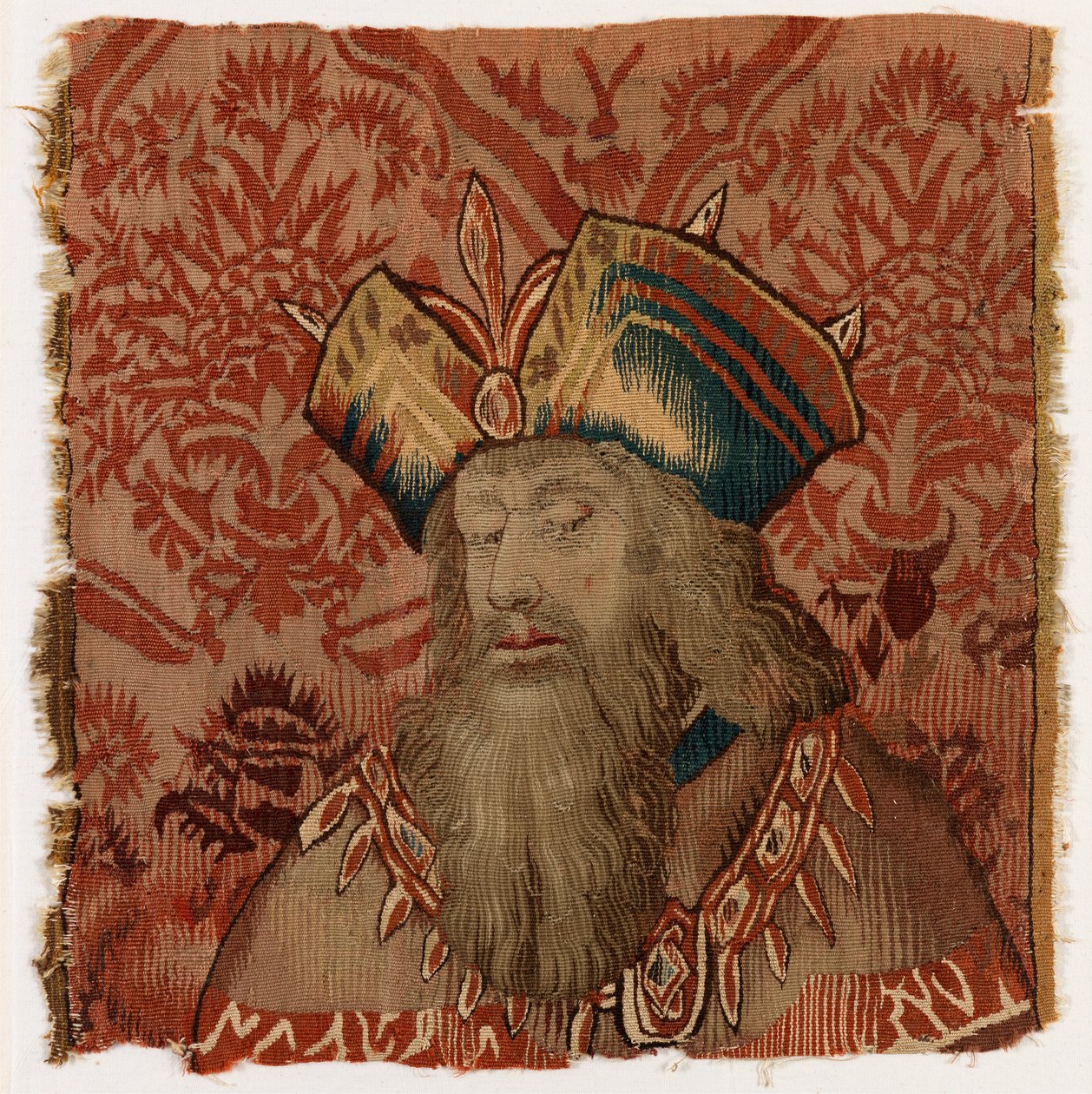 Panel gobelinowy przedstawiający głowę kapłana lub króla, wykonany prawdopodobnie w Tournai w Belgii, prawdopodobnie na początku XVI w. (wełna) autorstwa Belgian School