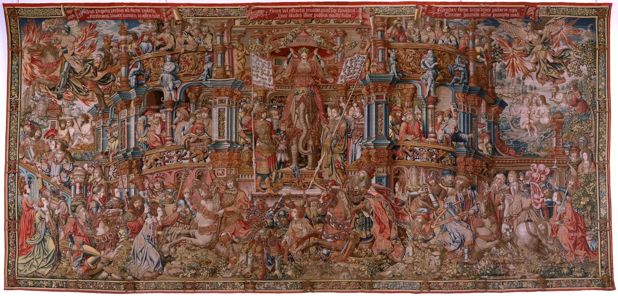 Flamandzki gobelin. Seria Honory. Sława (La Fama). Trzeci gobelin w serii. Wzorcowi rysownicy z kręgu Bernarda van Orleya i Jana Gossaerta (Mabuse). Manufaktura Pieter van Aelst, Bruksela. Około 1550. Tkanina Złoto, srebro, jedwab i wełna. autorstwa Bernard van Orley