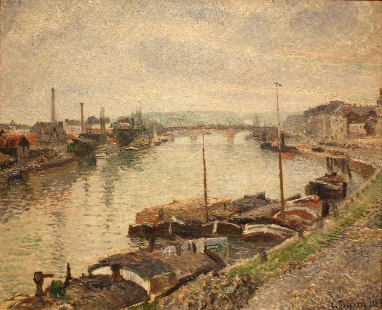 Kamienny most i barki w Rouen autorstwa Camille Jacob Pissarro