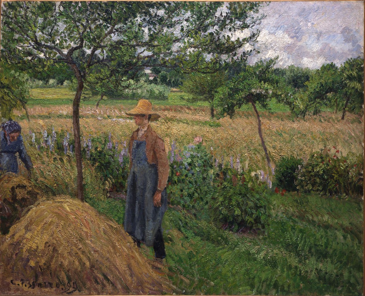 Ogrodnik stojący przy stogu siana, zachmurzone niebo, Éragny autorstwa Camille Pissarro