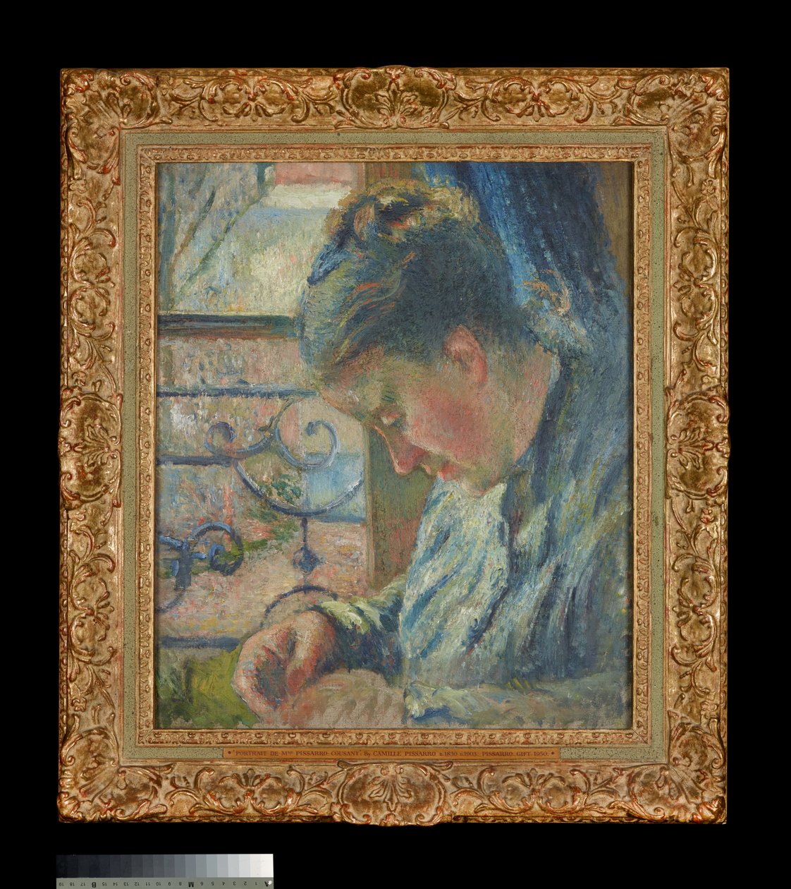 Julie Pissarro Szyje przy oknie autorstwa Camille Pissarro