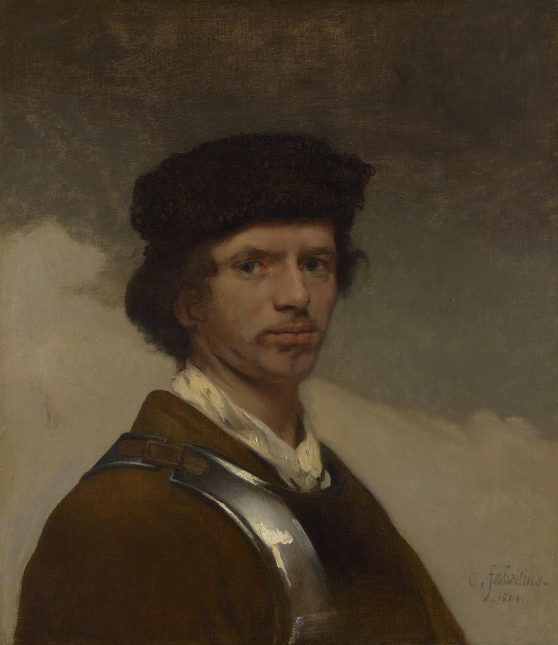 Młody mężczyzna w futrzanej czapce autorstwa Carel Fabritius