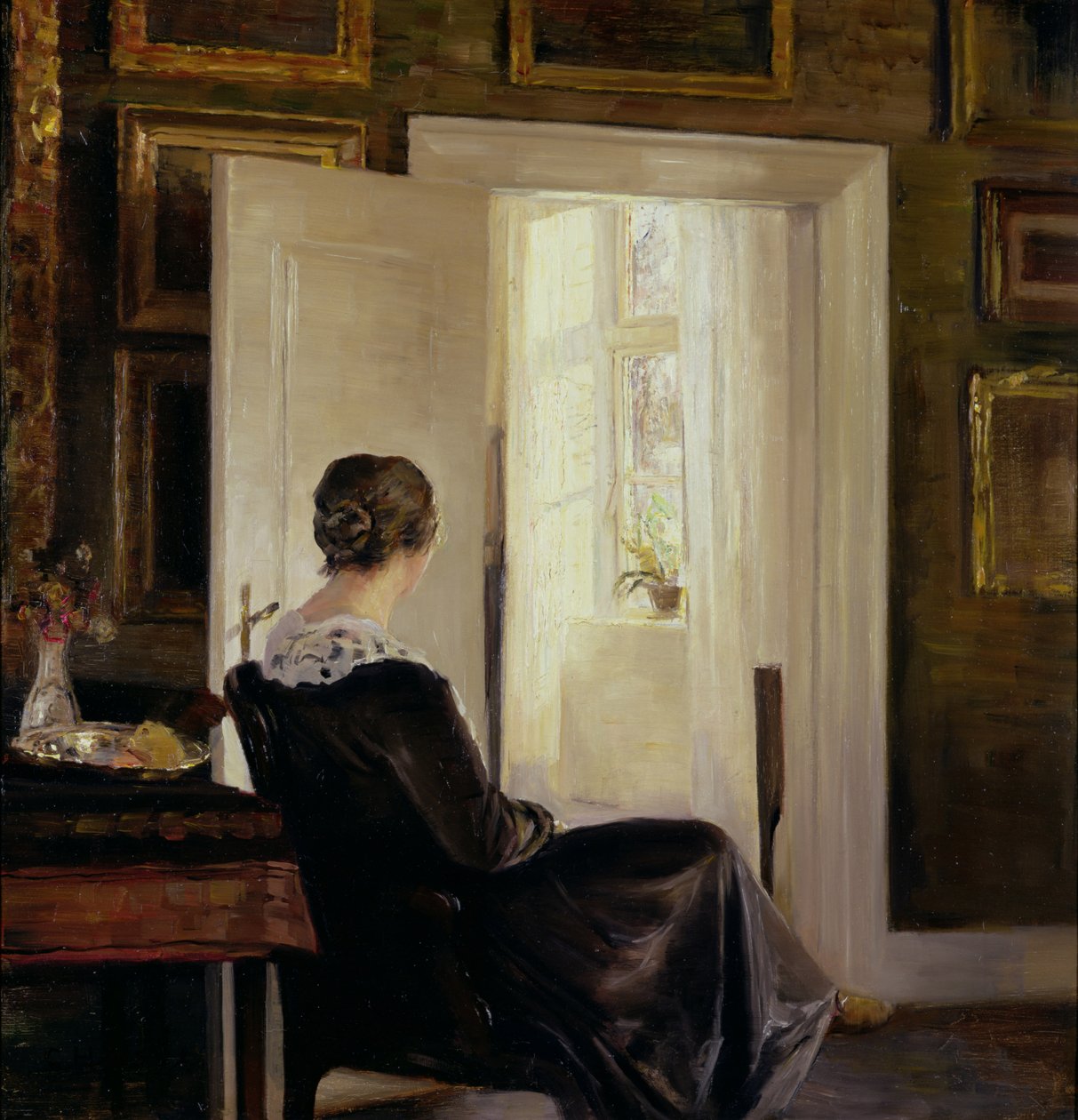 Kobieta siedząca przy drzwiach autorstwa Carl Holsoe