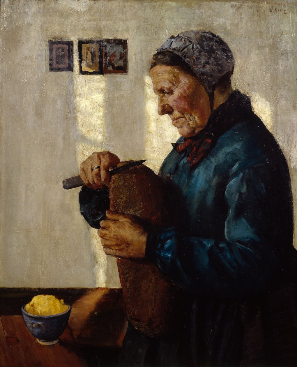 Żona krojąca chleb autorstwa Christian Krohg