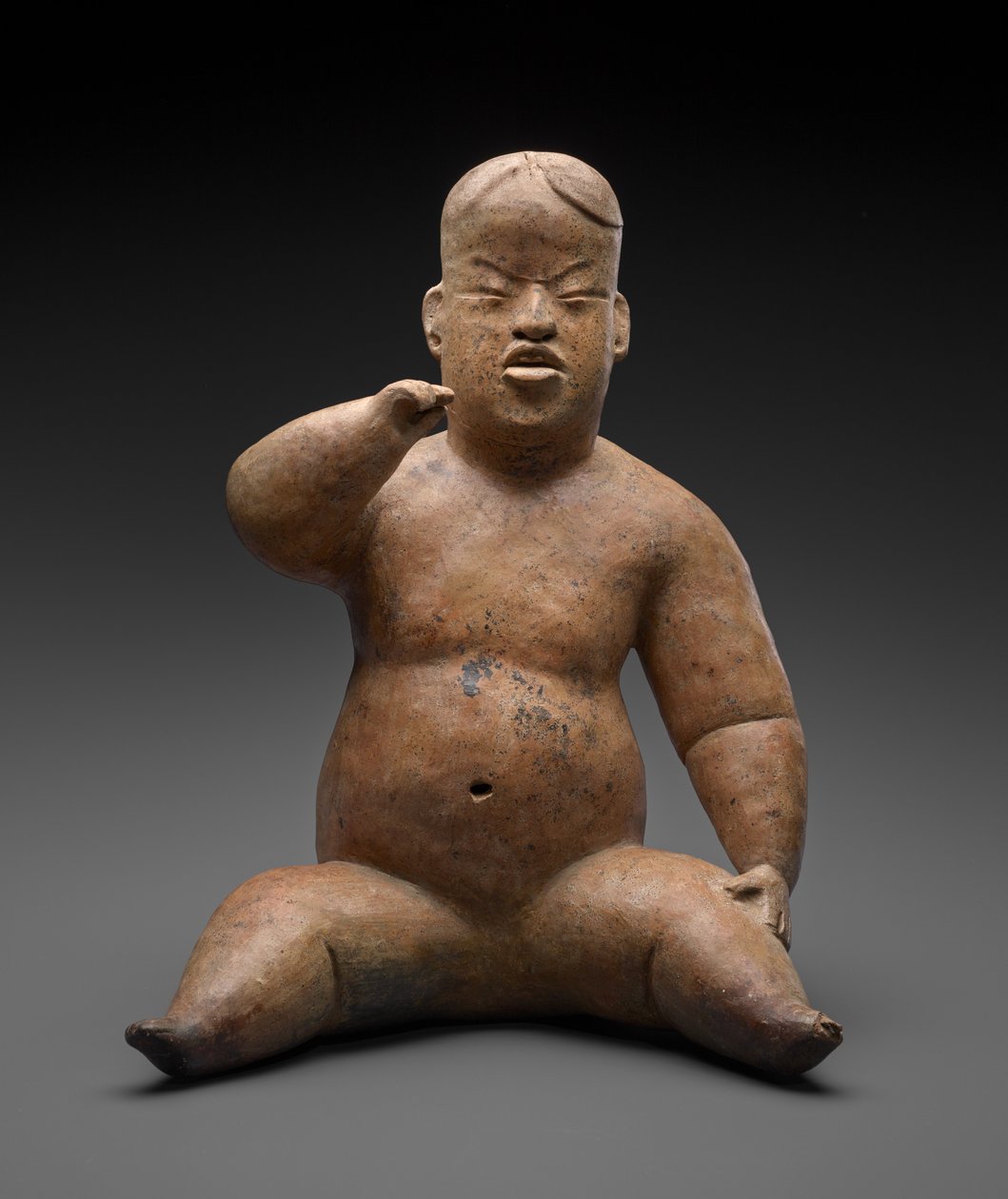 Siedząca postać autorstwa Culture Olmec