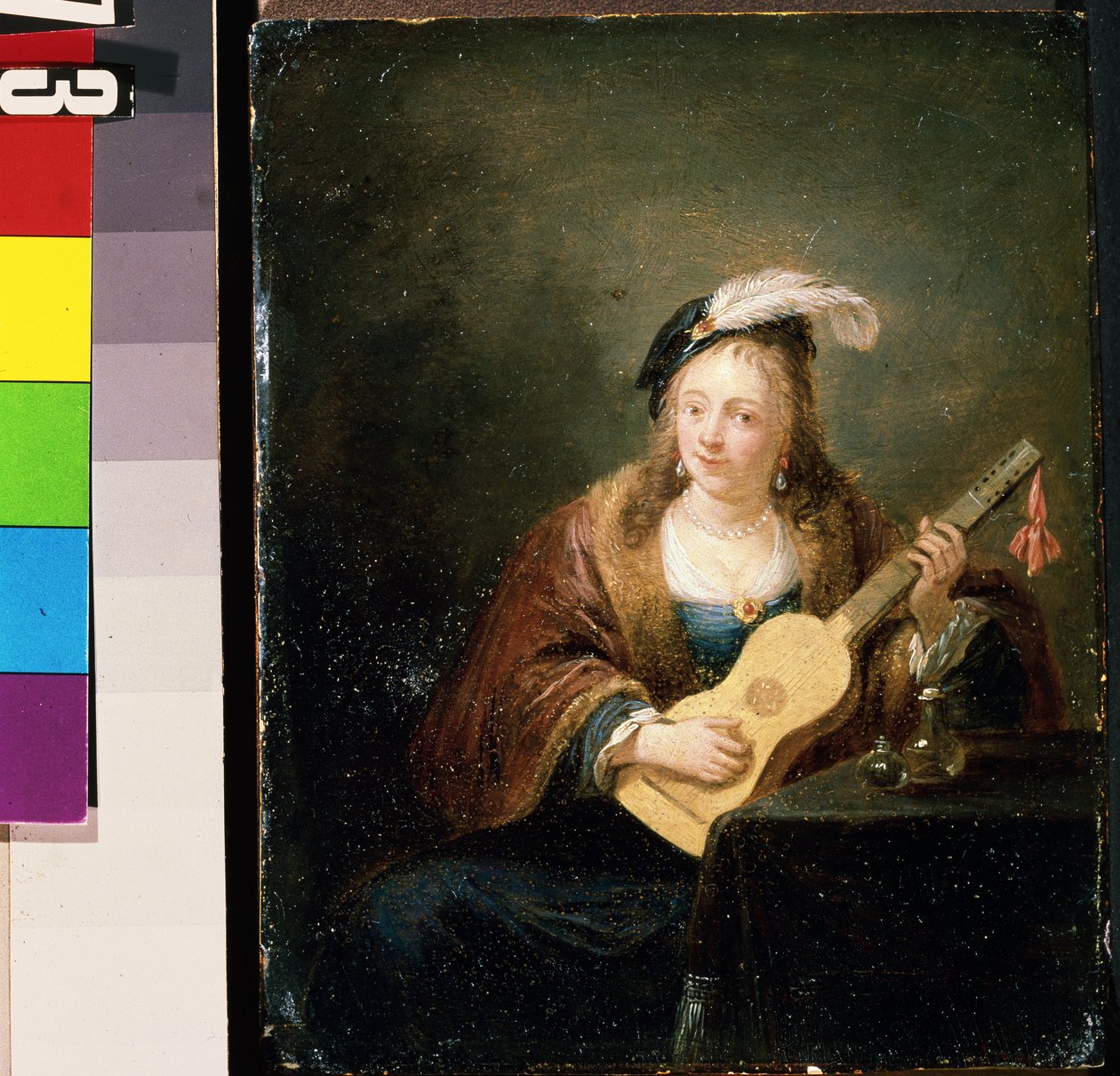 Kobieta z gitarą. Obraz Davida Teniersa młodszego (1610-1690). Olej na drewnie autorstwa David Teniers the Younger