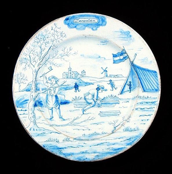 Tabliczka Delftware przedstawiająca miesiąc grudzień (ceramika glazurowana cyną) autorstwa Dutch School