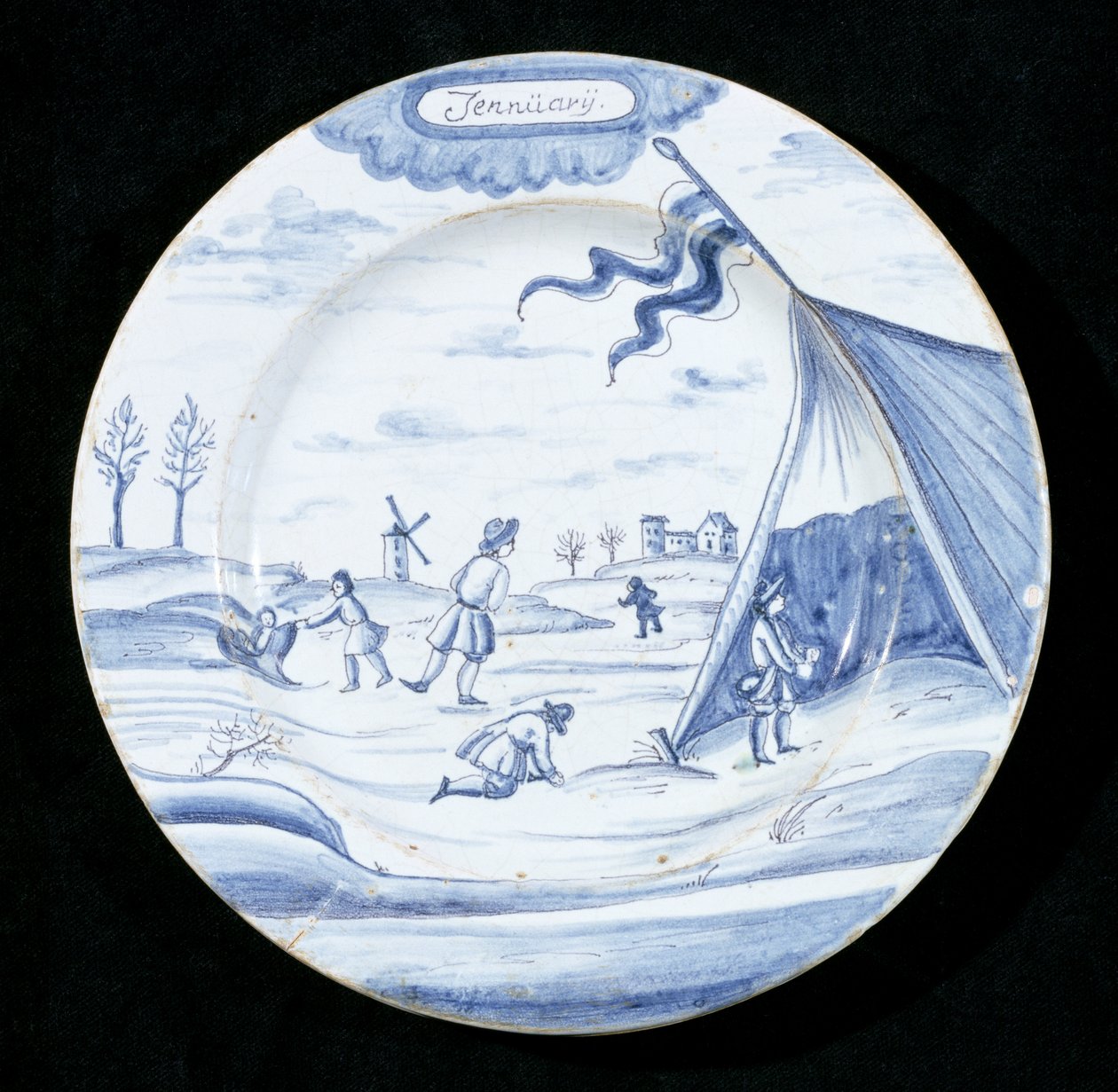 Tabliczka Delftware przedstawiająca miesiąc styczeń (ceramika glazurowana cyną) autorstwa Dutch School