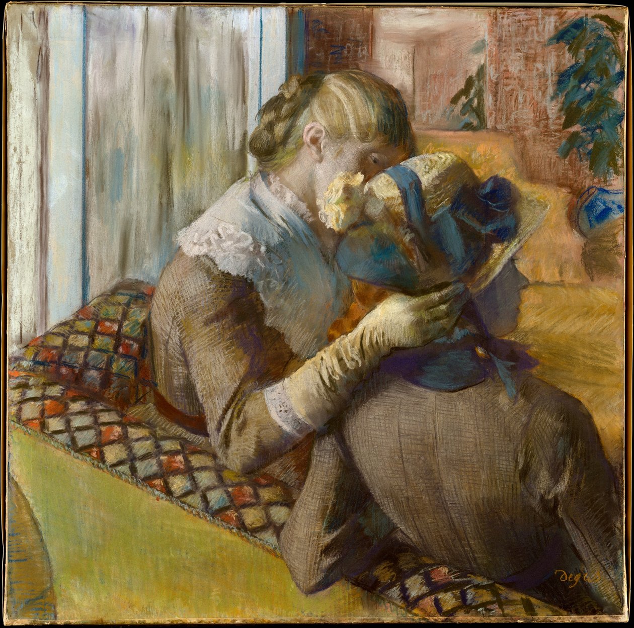 U modystki autorstwa Edgar Degas