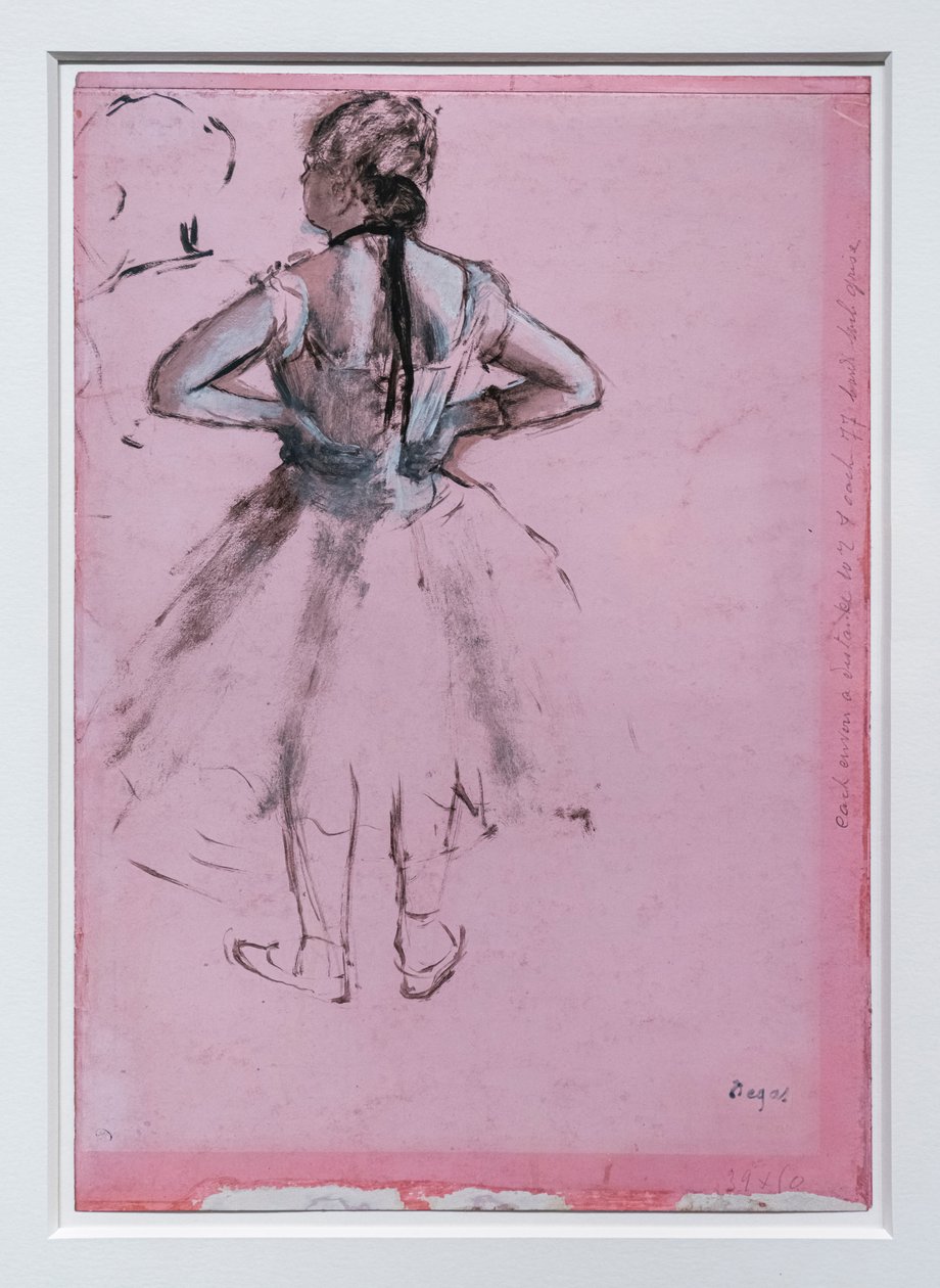 Tancerz, widok z tyłu, ręce na biodrach. Około 1873 r. Obraz olejny na papierze autorstwa Edgar Degas