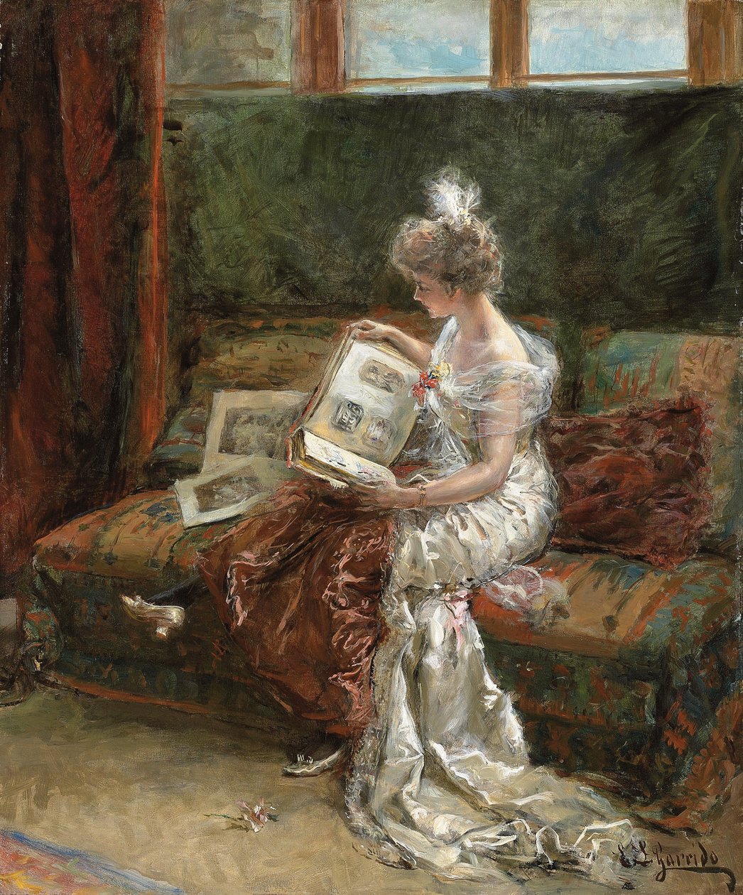 Leonie Garrido patrząc na album odbitek, autorstwa Eduardo Leon Garrido