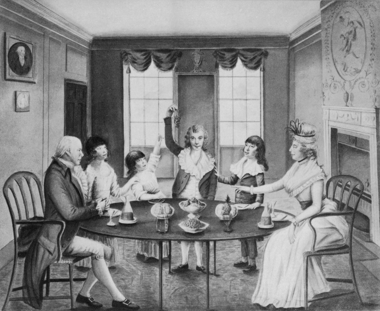 Wnętrze z damą i dżentelmenem siedzącymi przy stole z czwórką dzieci stojących za nim, ok.1780 autorstwa English School