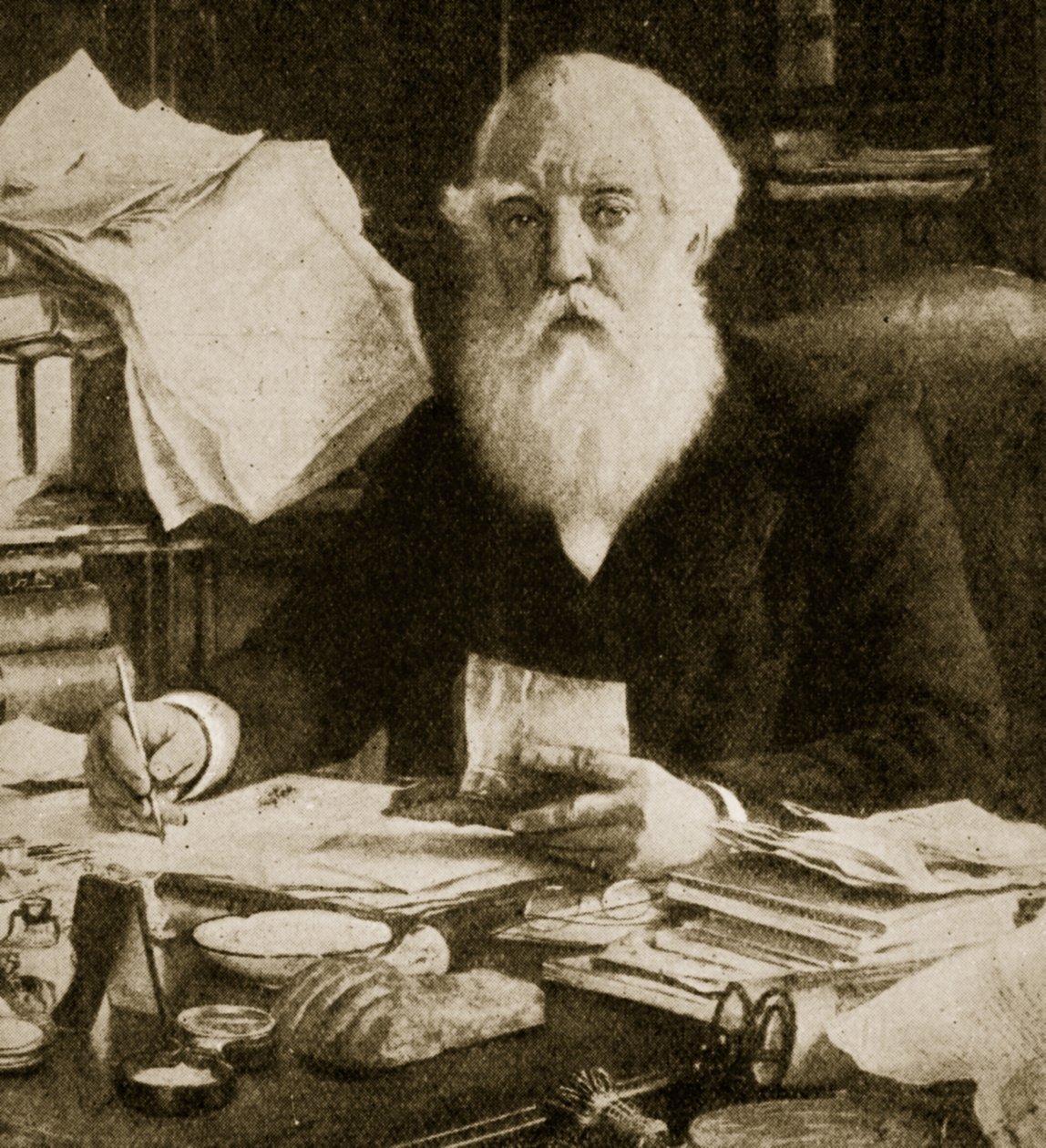 Austen Henry Layard siedzący przy swoim biurku autorstwa English School