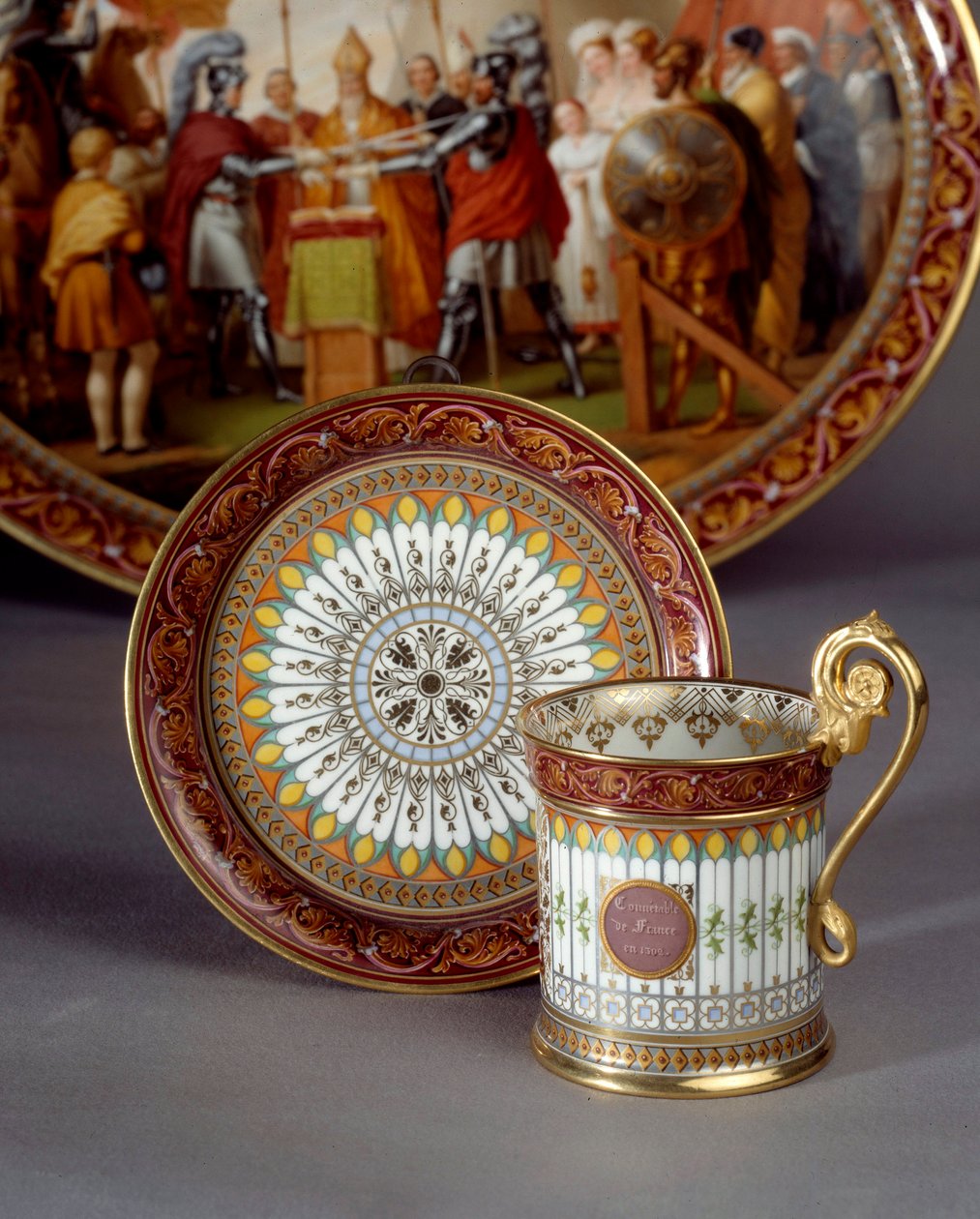 Porcelanowa filiżanka i spodek z czekolady. Realizacja: Etienne Charles Leguay (1762-1846) 1835 Sevres, fabryka porcelany autorstwa Etienne Charles Leguay