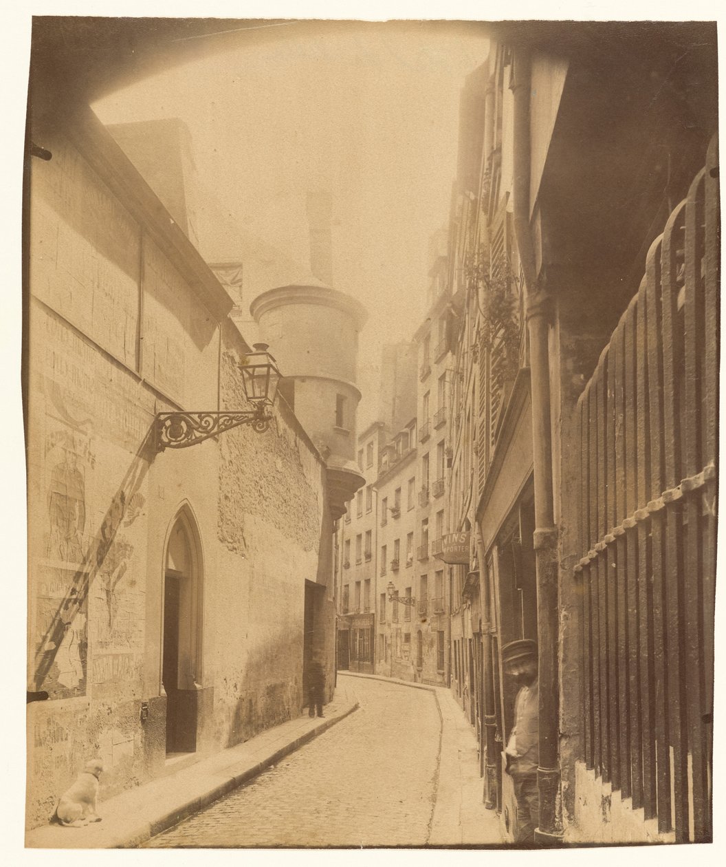 Ulica Hôtel de Ville autorstwa Eugène Atget