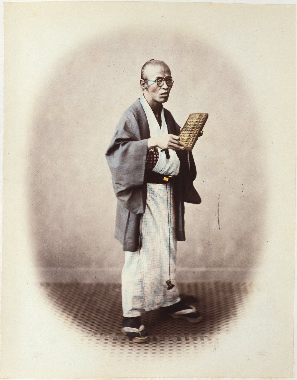 Urzędnik, ok.1868 autorstwa Felice Beato