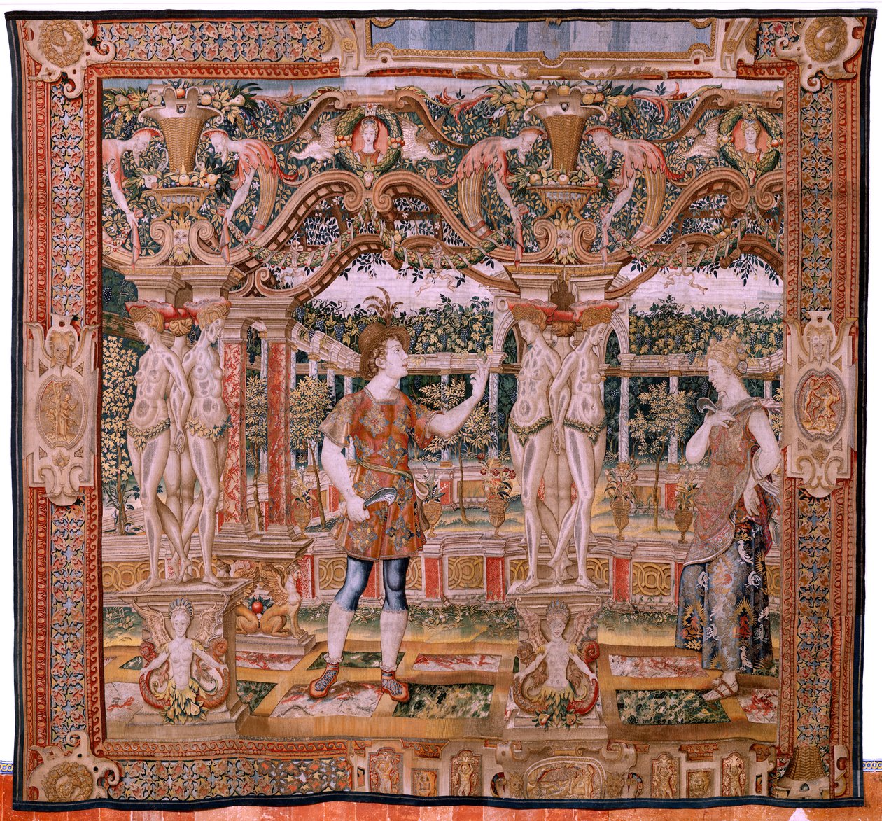 Flamandzki gobelin. Seria Vertumnus i Pomona. Nr IV Vertumnus przekształcony w sekator (Vertumno y Pomona IV (Vertumno transformado en podador). Modele Koło Pietera Coecke Van Aelsta i Léonarda Thiry. Atelier nieznane, Bruksela. Złoto, jedwab i wełna. B autorstwa Flemish School