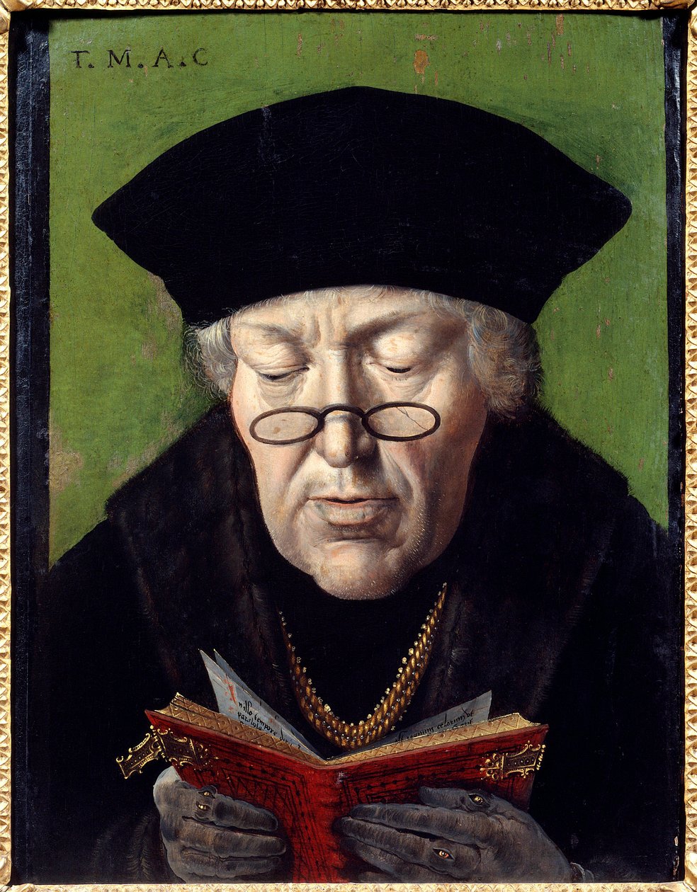 Portret Thomasa More (1478-1535), humanisty. Humanista jest reprezentowany w okularach czytając książkę. Malarstwo flamandzkiej szkoły autorstwa Flemish School