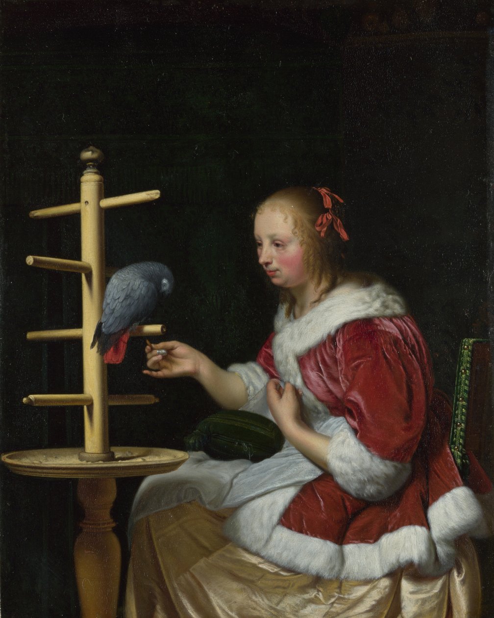 Kobieta w czerwonej kurtce karmiąca papugę, ok. 1663 autorstwa Frans van Mieris the Elder