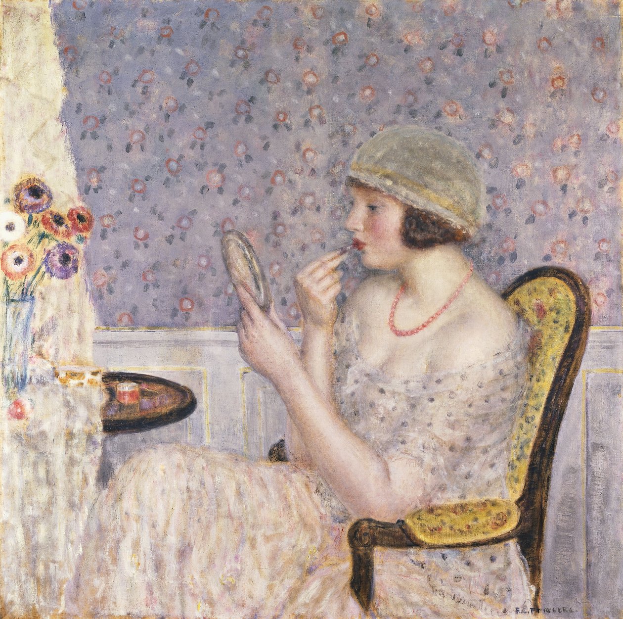 Kobieta przy toaletce autorstwa Frederick Carl Frieseke