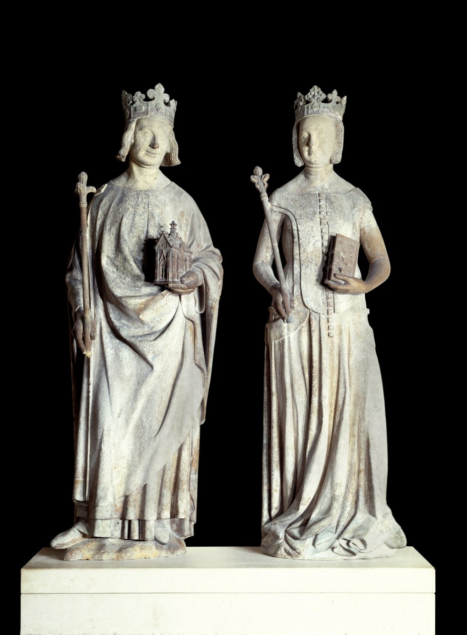 Art France: Posągi króla Francji Karola V znanego jako Karol Mądry (1338-1380) i królowej Francji Jeanne de Bourbon (1337-1378). Rzeźba w wapieniu z XIV wieku. Prawdopodobnie z fasady wschodniego wejścia do Luwru (dekor autorstwa French School