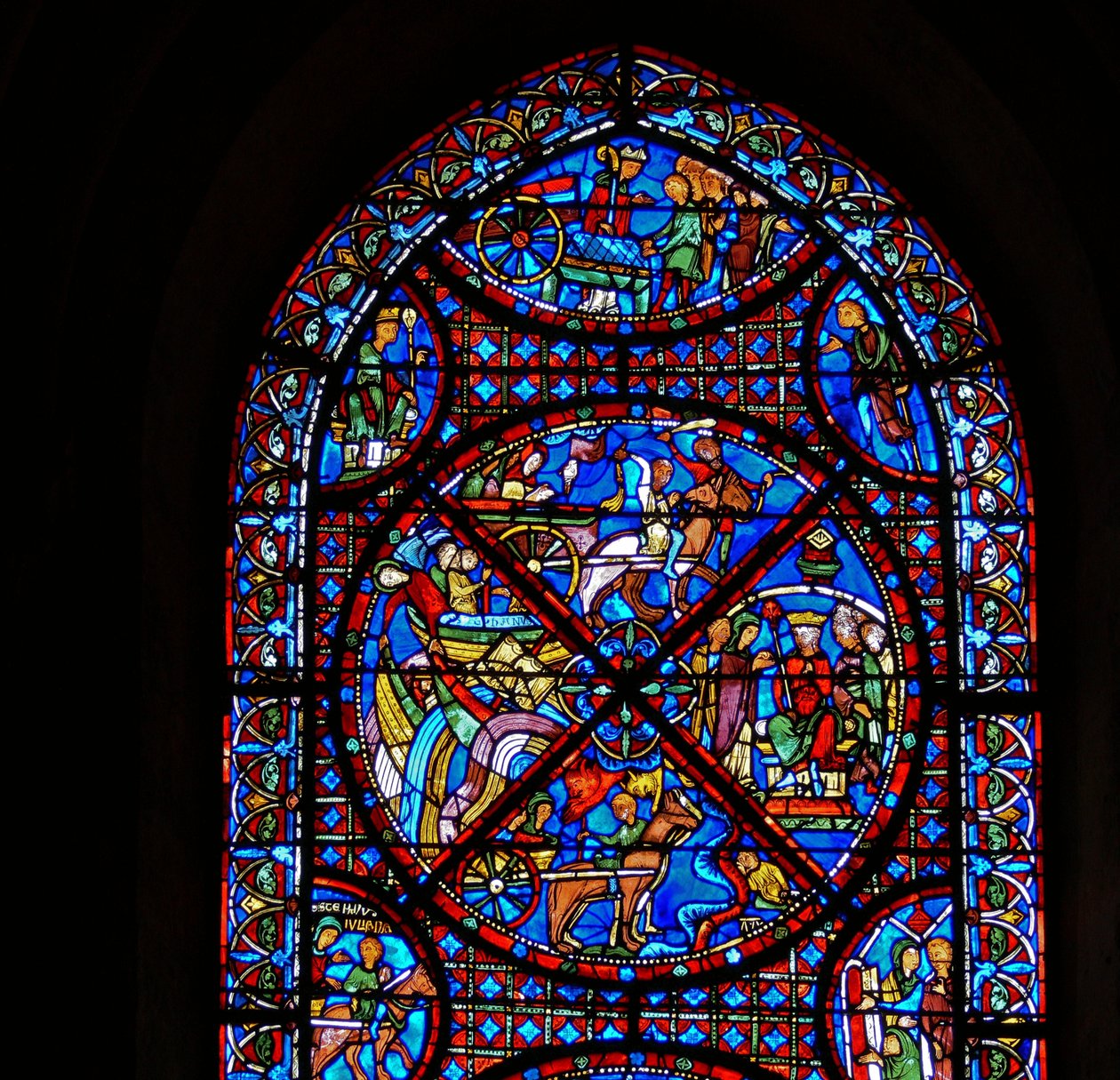 Fragment okna przedstawiający sceny z życia św autorstwa French School