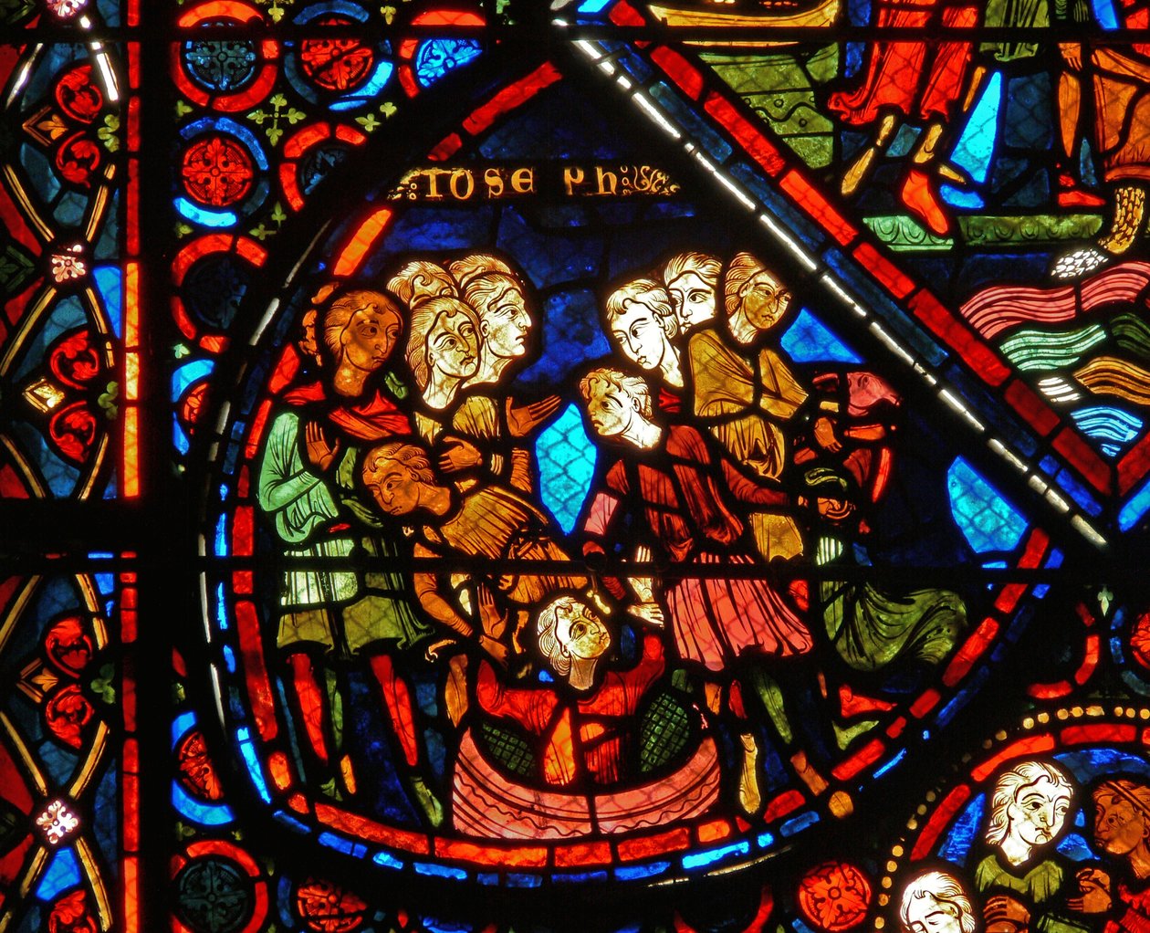 Fragment okna przedstawiający sceny z historii Józefa autorstwa French School