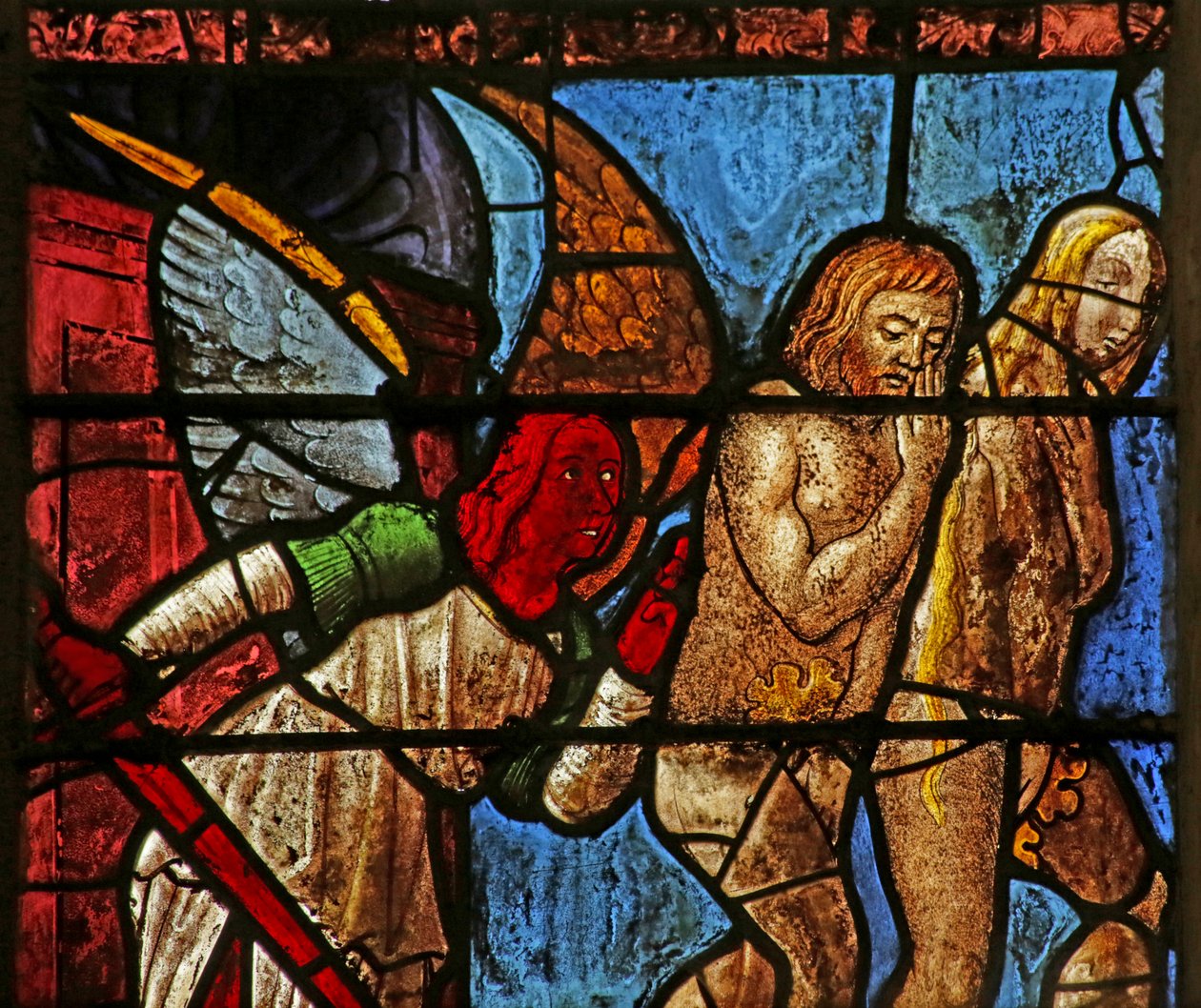 Okno przedstawiające Adama i Ewę wydalonych z Edenu (witraż) autorstwa French School