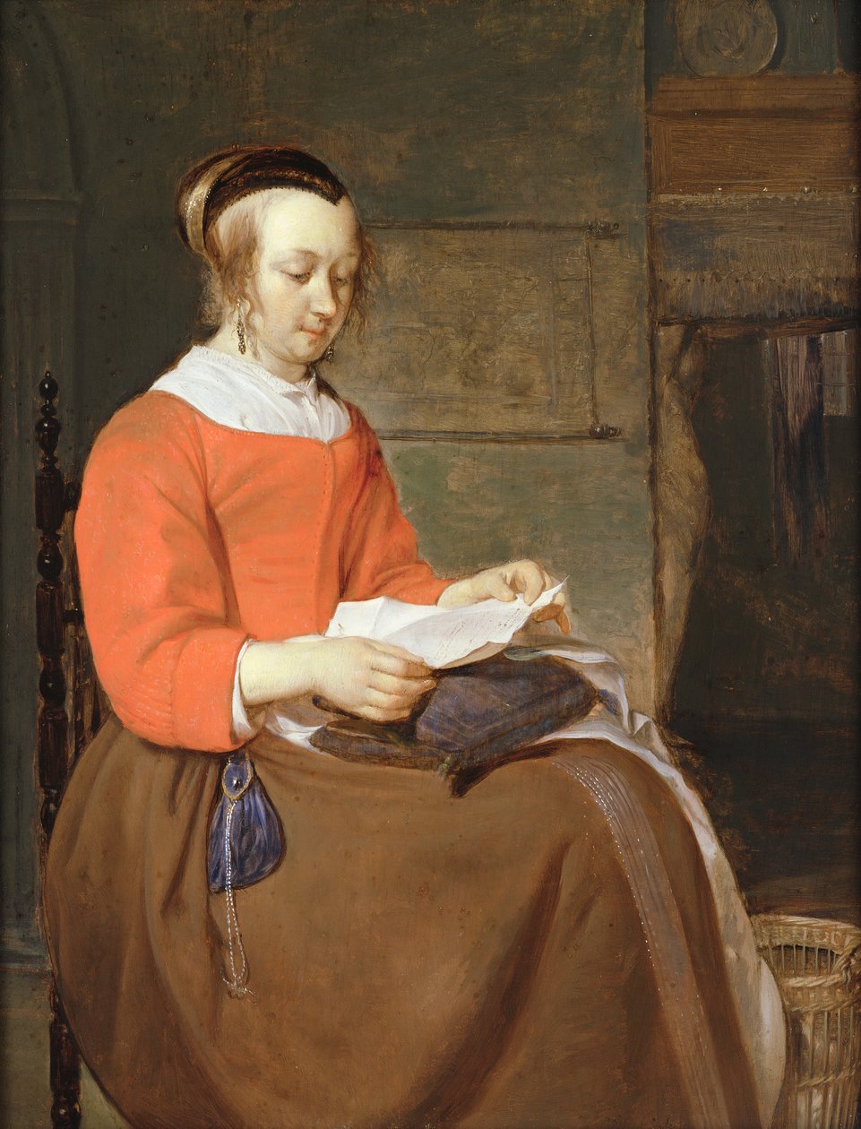 Młoda kobieta siedząca we wnętrzu, czytająca list autorstwa Gabriel Metsu