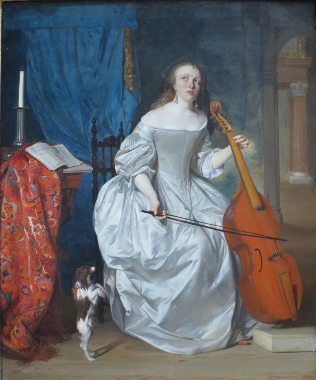 Kobieta grająca na violi de gamba autorstwa Gabriel Metsu